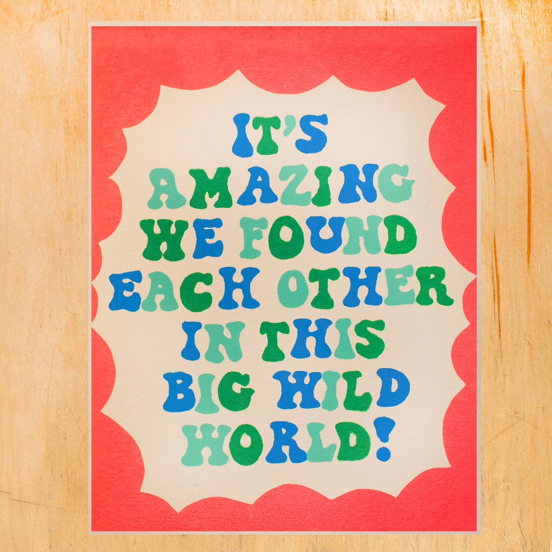 a colorful greeting card with "it's amazing we found each other in this big wild world" text