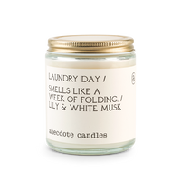 laundry day candle with lily and white musk scent notes