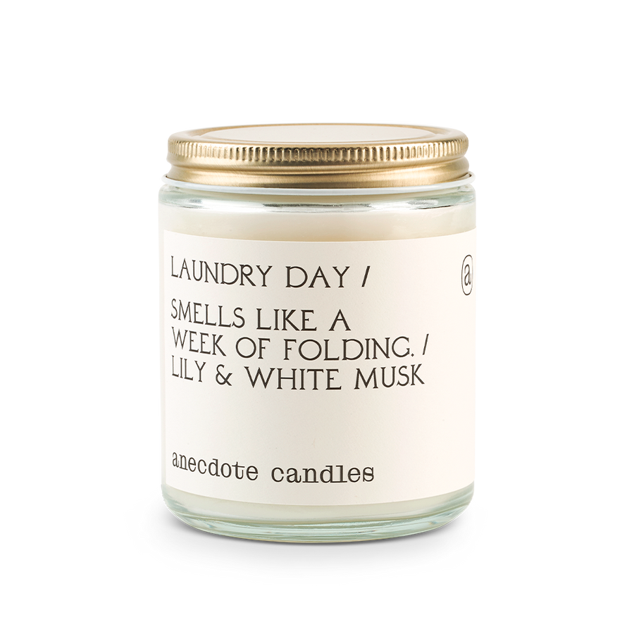 laundry day candle with lily and white musk scent notes