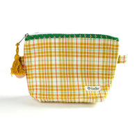 Yellow checkered pouch with a tassel 