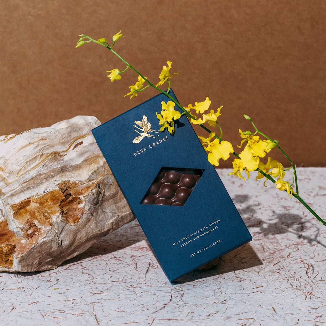 milk chocolate bar with ginger sesame and buckwheat