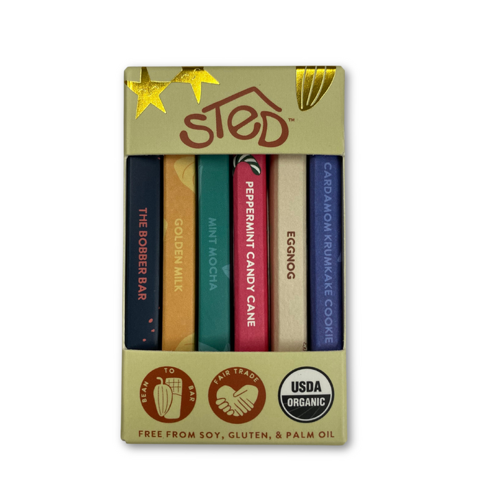 variety pack of 6  b mini holiday chocolate bars. eggnog, peppermint candy cane,, mint mocha, golden milk, cardamom krumkake cookie, and dark chocolate sea salt 