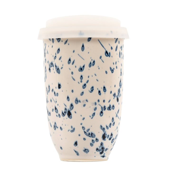 cream ceramic travel mug with blue speckles orchid themed 