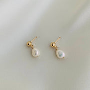 Pair of pearl earrings with gold posts 