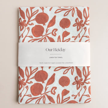 pomegranate patterned tea towel by our heiday 