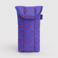 A blue padded phone pouch with a red smiley face pattern, shown on a light gray background.
