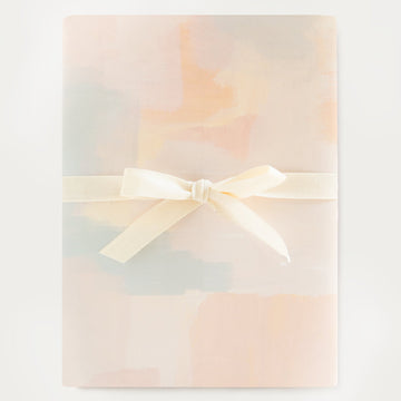 calming painterly stroked patterned gift wrap roll with soft colors 