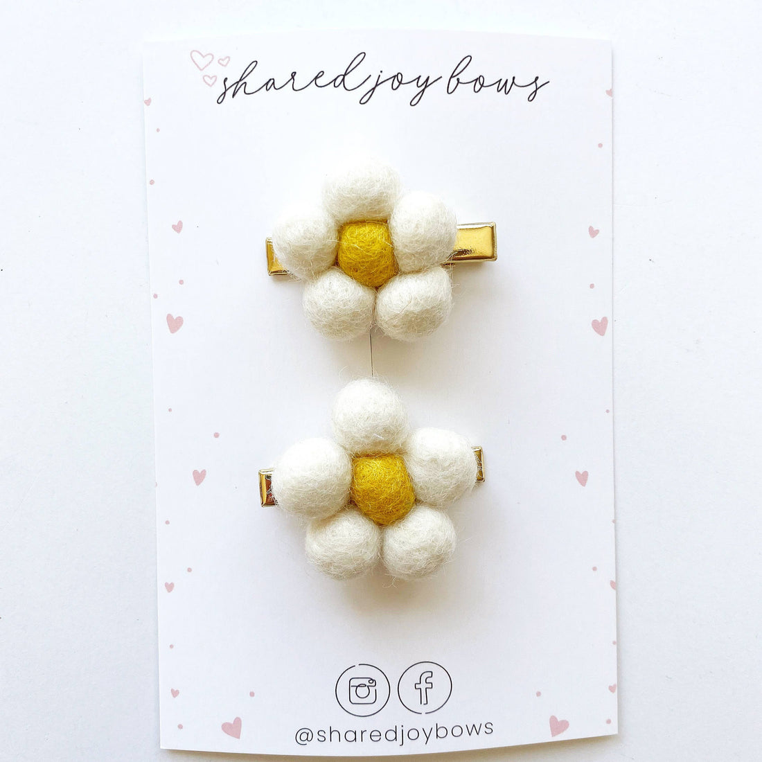 white felt floral hair clips