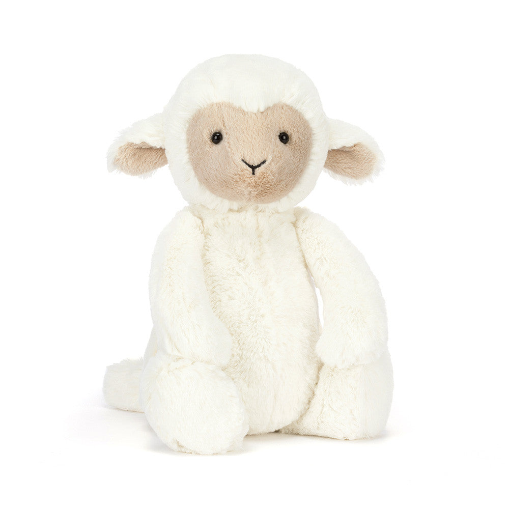 Stuffed toy lamb with white fleece and beige face 
