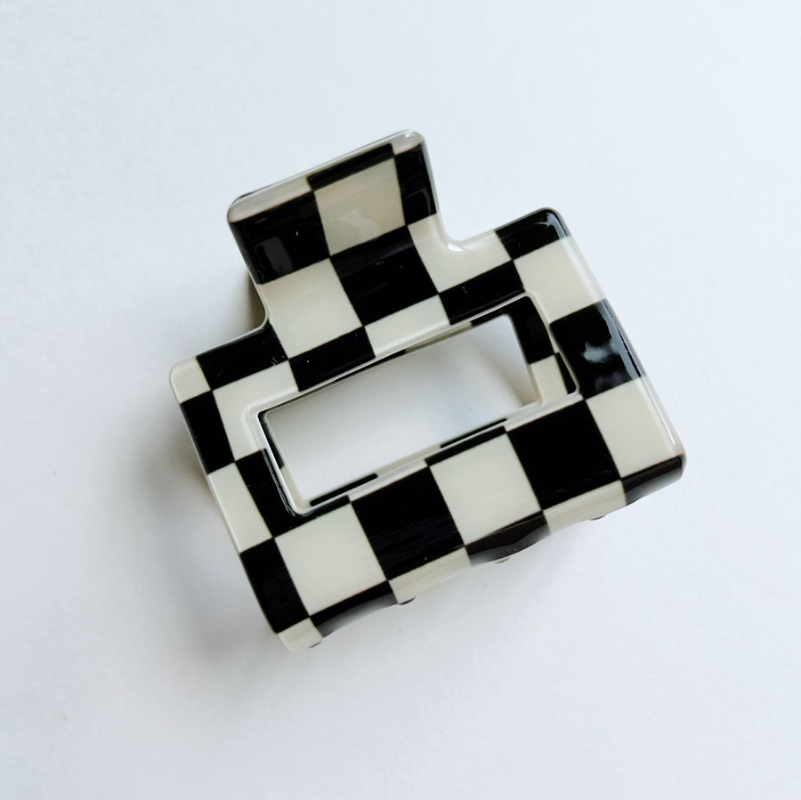 small black and white checkered hair claw 