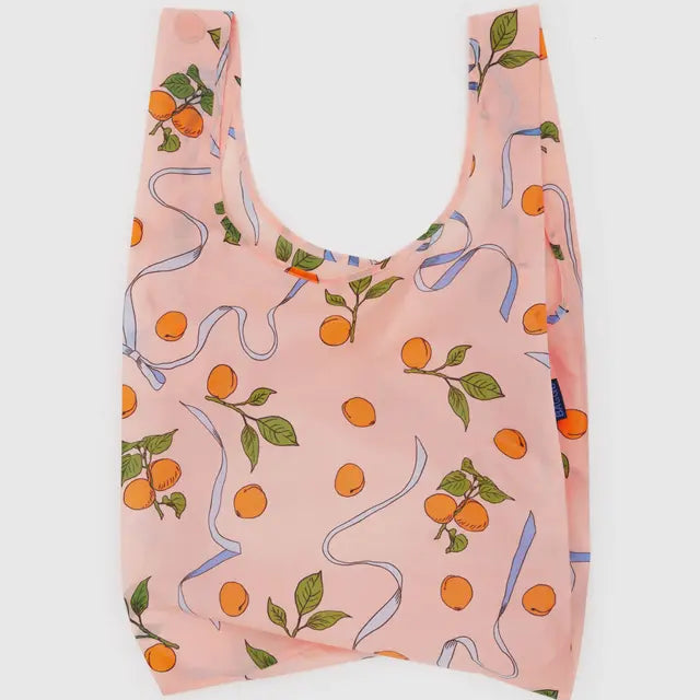 pink baggu with apricots and blue ribbons