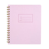 lilac lined notebook with gold spiral binding 