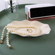 cream scalloped jewelry dish