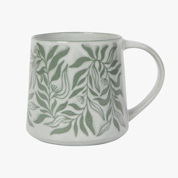 light sage green mug with leaf pattern