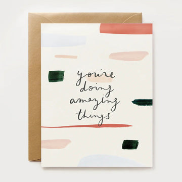 Greeting card with 'you're doing amazing things' text and abstract designs