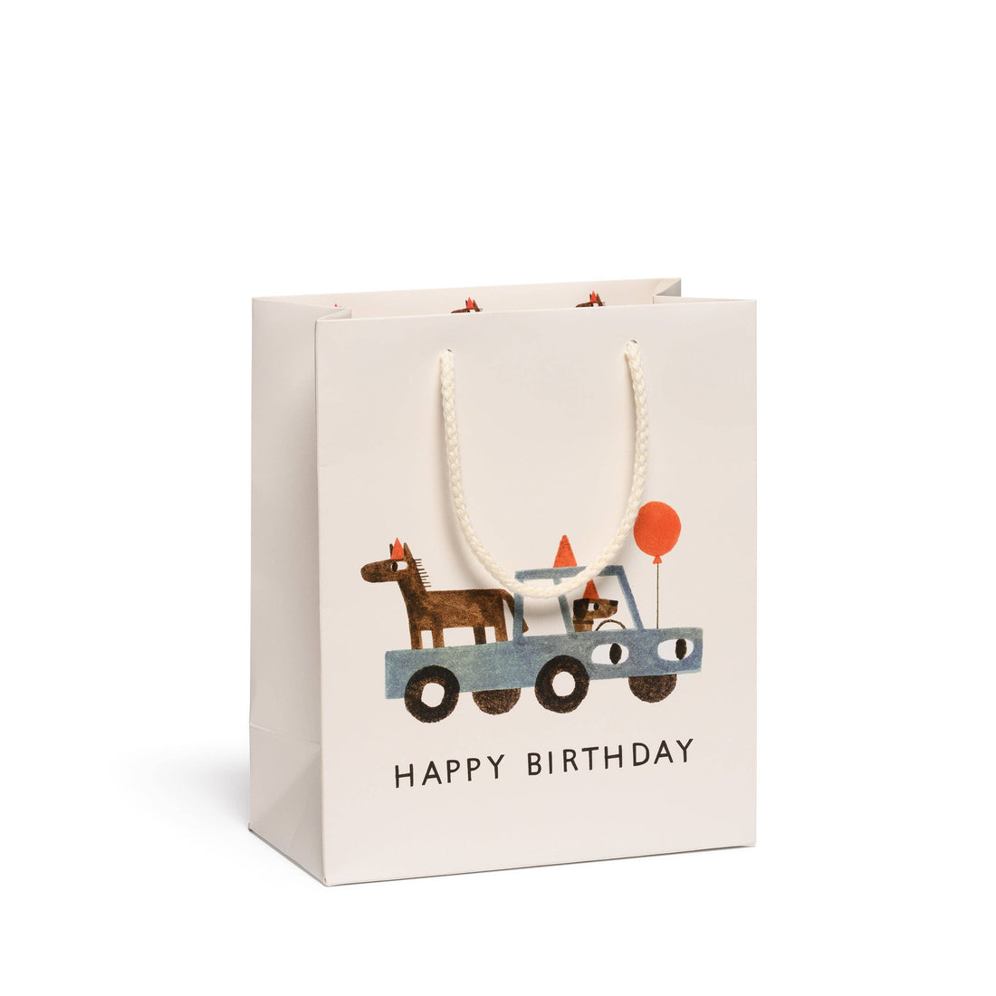 medium gift bag with a truck, dog, and horse for a birthday