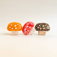 hair clip in the shape of a mushroom