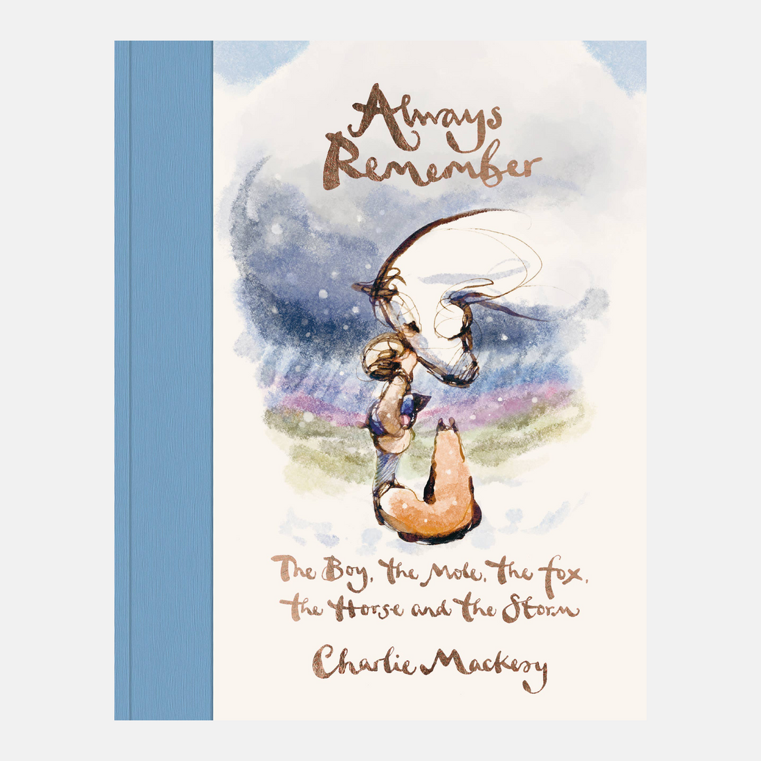 The book cover of 'Always Remember: The Boy, the Mole, the Fox, the Horse and the Storm' by Charlie Mackesy, featuring a watercolor illustration of a boy and a fox and horse embracing under a starry sky, with a light blue spine band 