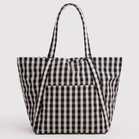 A black and white gingham check canvas tote bag with dual shoulder straps, shown against a plain light gray background.