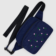 embroidered wildflower with navy fabric 
fanny pack
