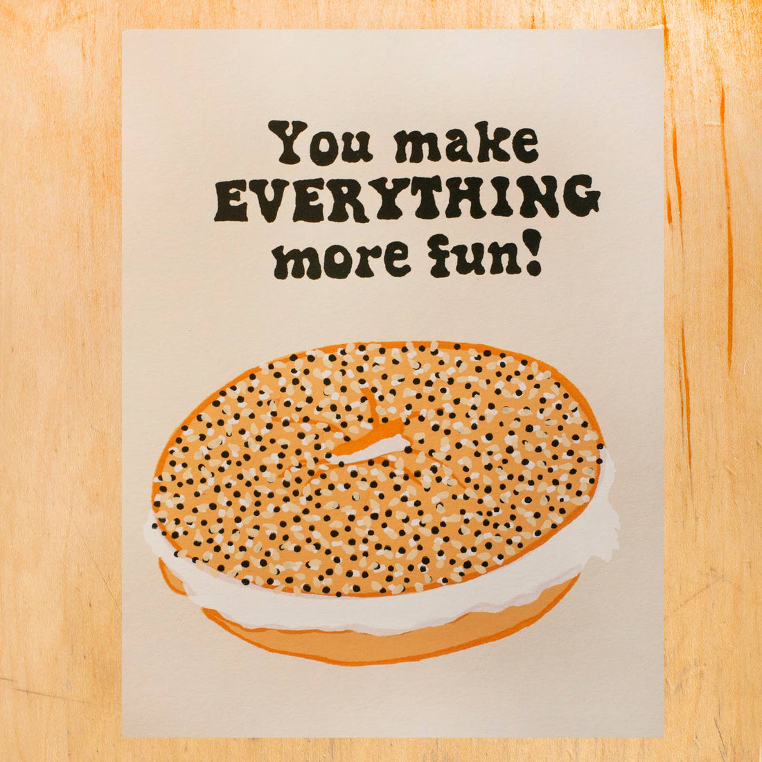 a card with an everything bagel with "you make everything more fun" text 