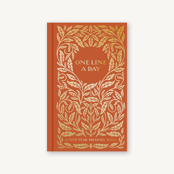 5 year one line a day keepsake journal with an orange cover and gold foiling 