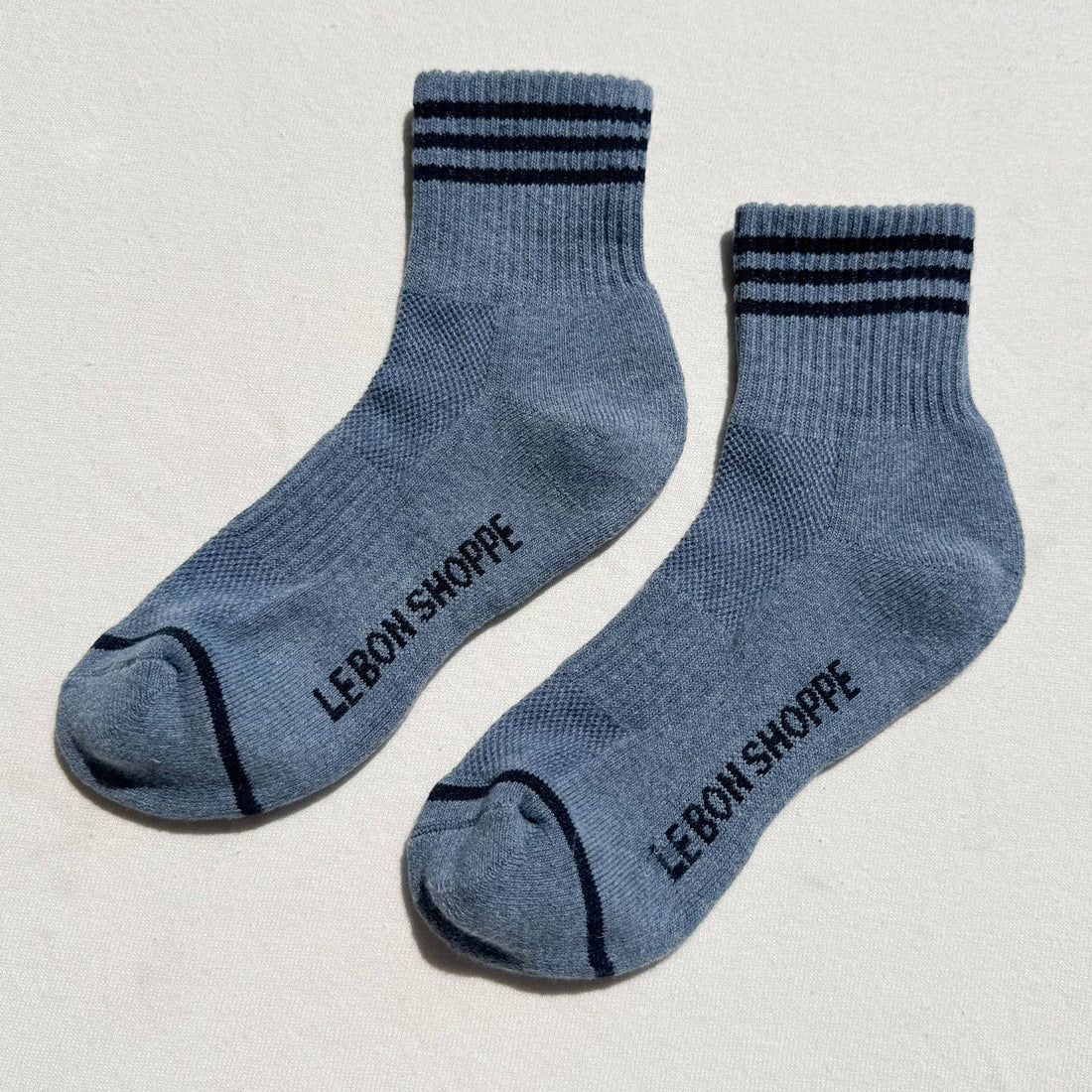 indigo colored socks with stripes 