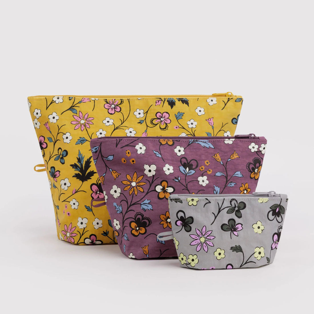 set of 3 varying sized travel pouches with floral patterns