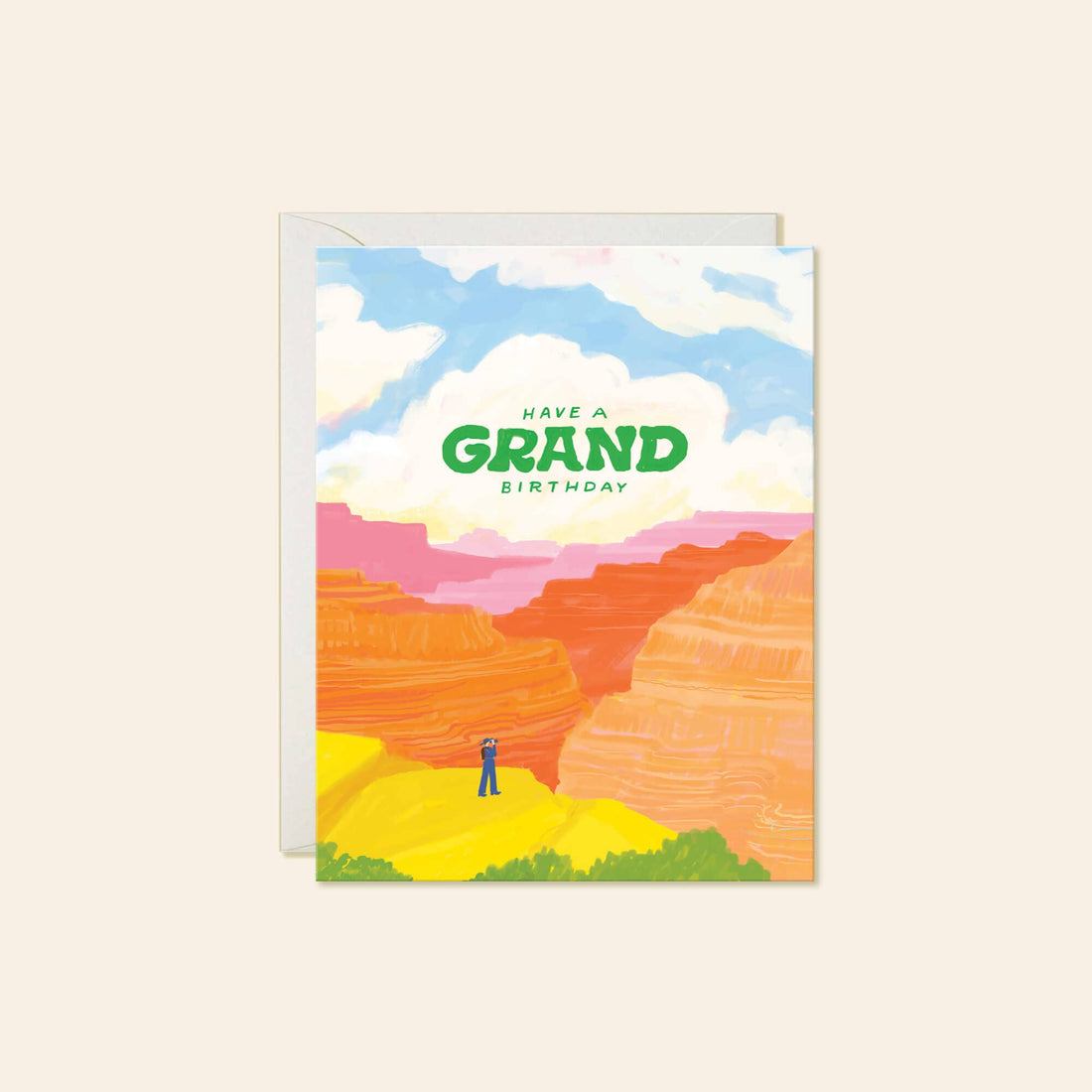 A greeting card with a colorful canyon landscape illustration and the text 'HAVE A GRAND BIRTHDAY'