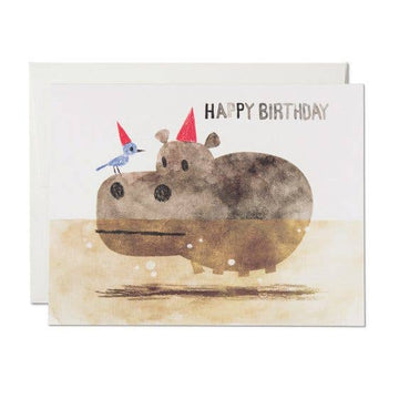 Birthday card with a hippo and bird illustration and 'Happy Birthday' text.
