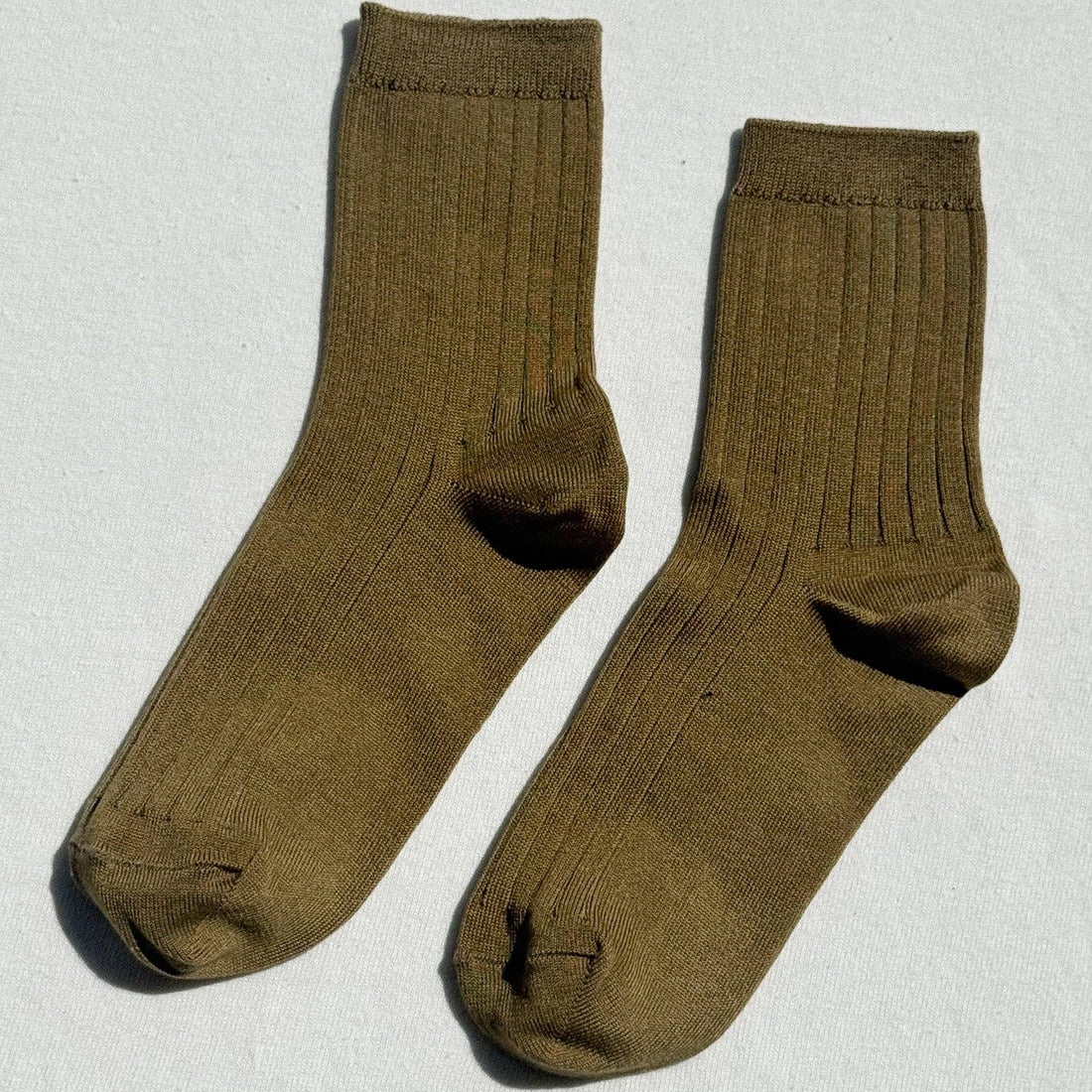 Le Bon her socks in pesto
