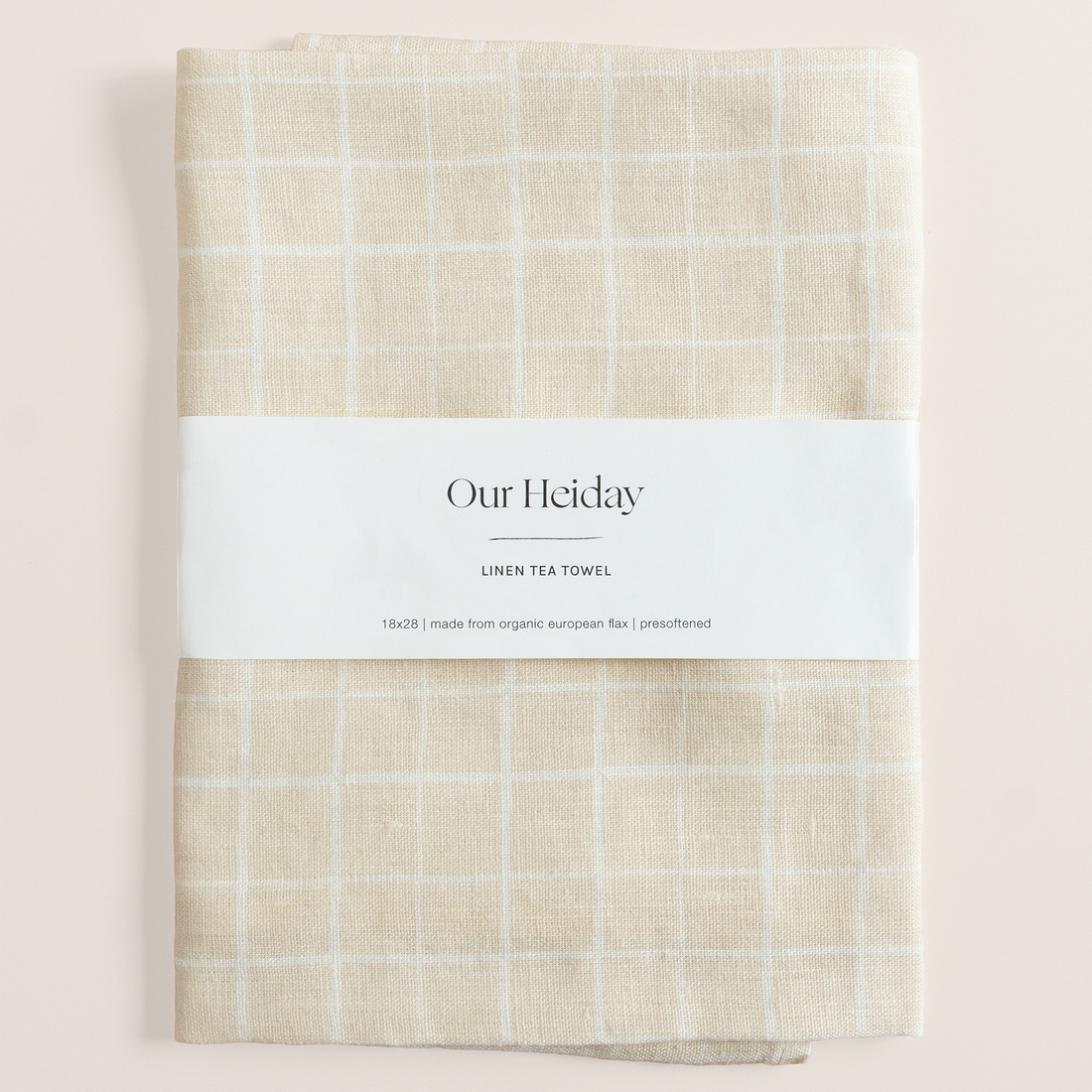 tan Linen tea towel with loose grid  pattern 