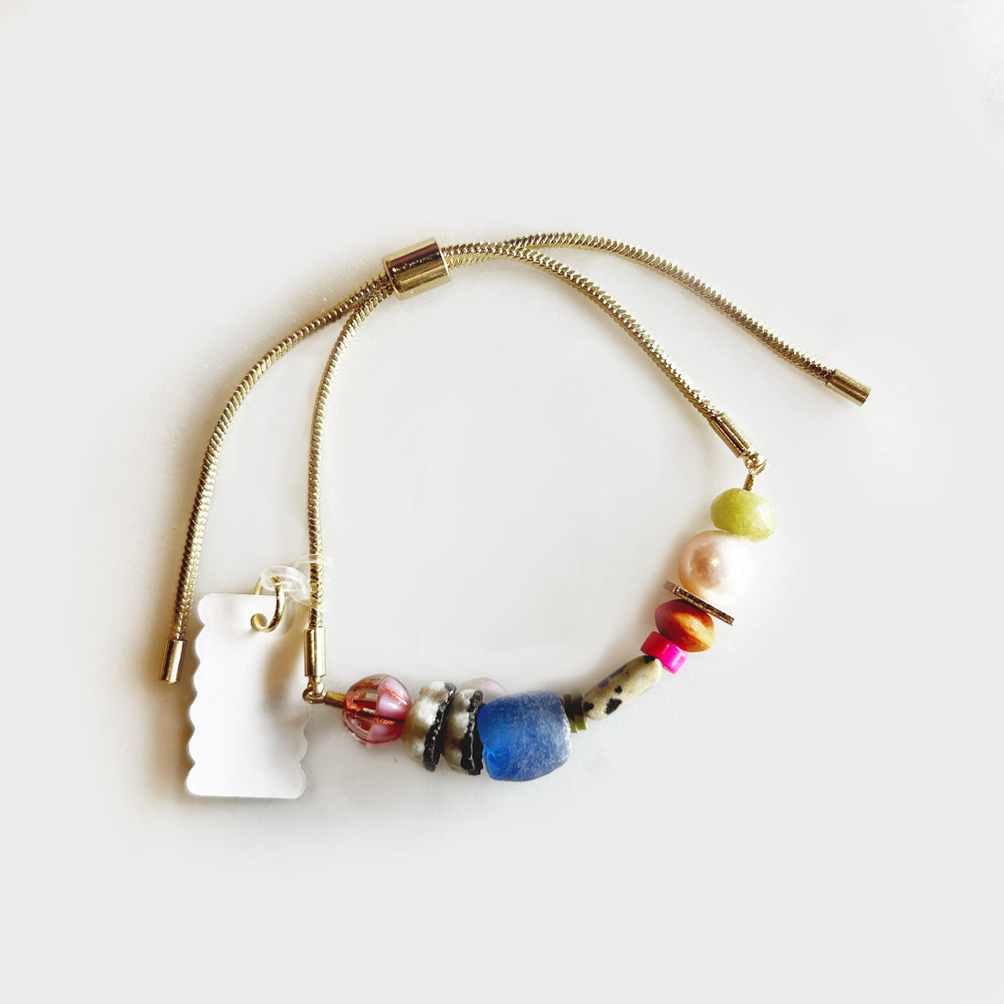 gold plated pull tie bracelet with beads 