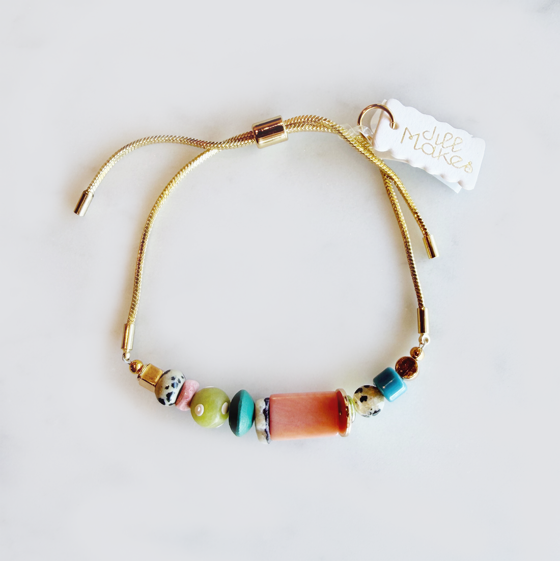 gold pull tie beaded bracelet 