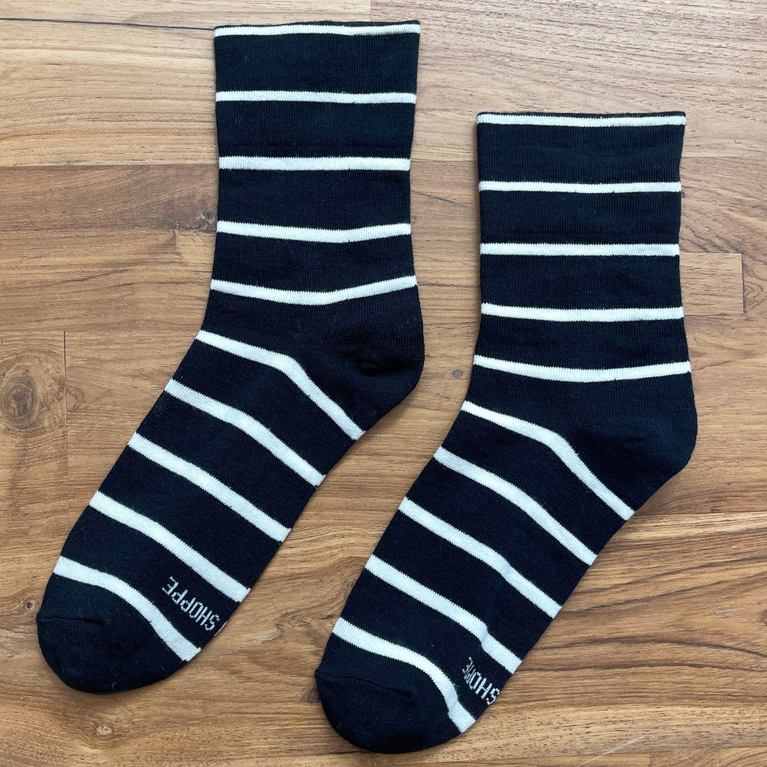 Pair of black and white striped socks 