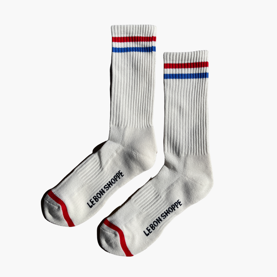 extended boyfriend socks in the color milk with red and blue stripes