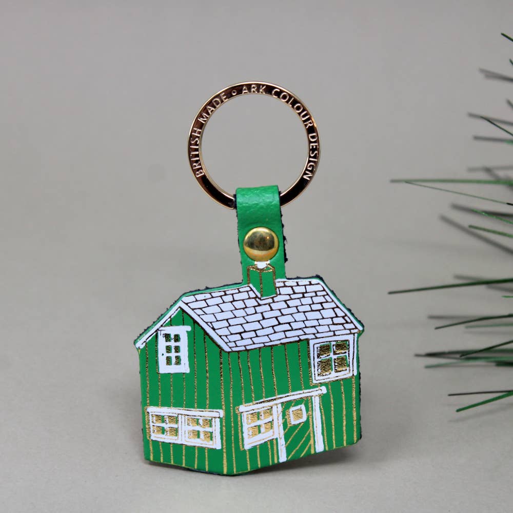 green log cabin leather keychain