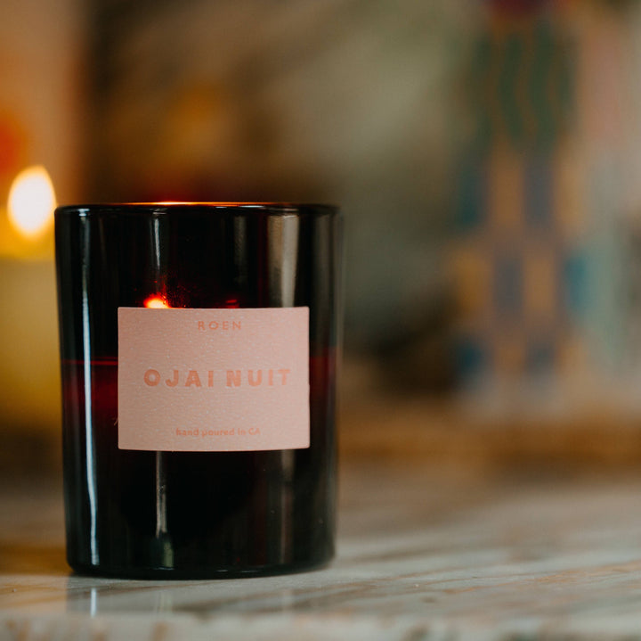 balsam fir, fig leaf, sandalwood, and amber scented candle