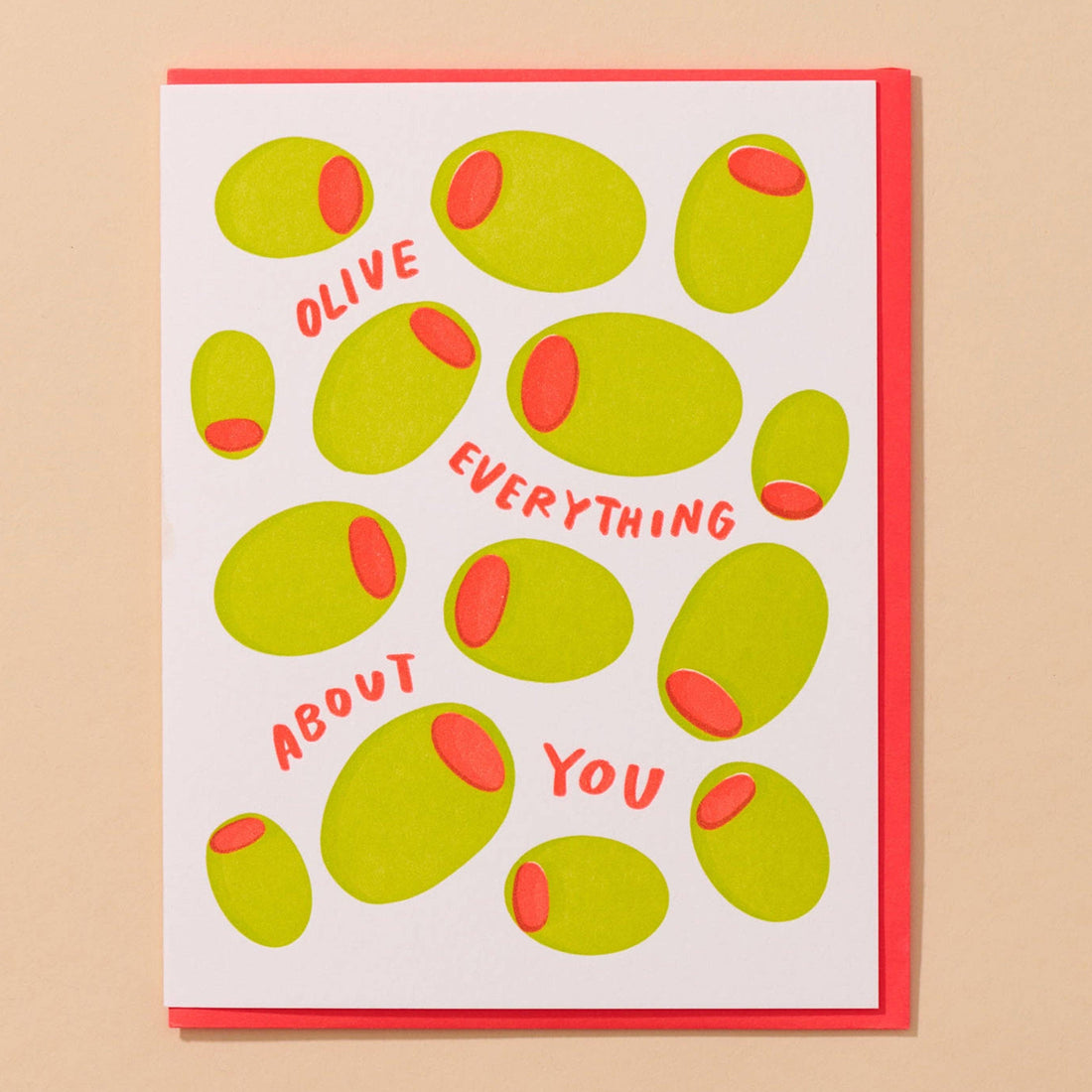 a card that says olive everything about you 