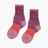 Pair of pink and purple color block crew socks 