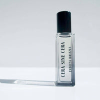 roll on perfume with notes of Pear, Freesia petals, Orange flower, Iris, Amber, Musk