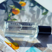 roll on perfume oil with notes of Violet, Berry, Sapodilla,  Magnolia, Musk Mallow