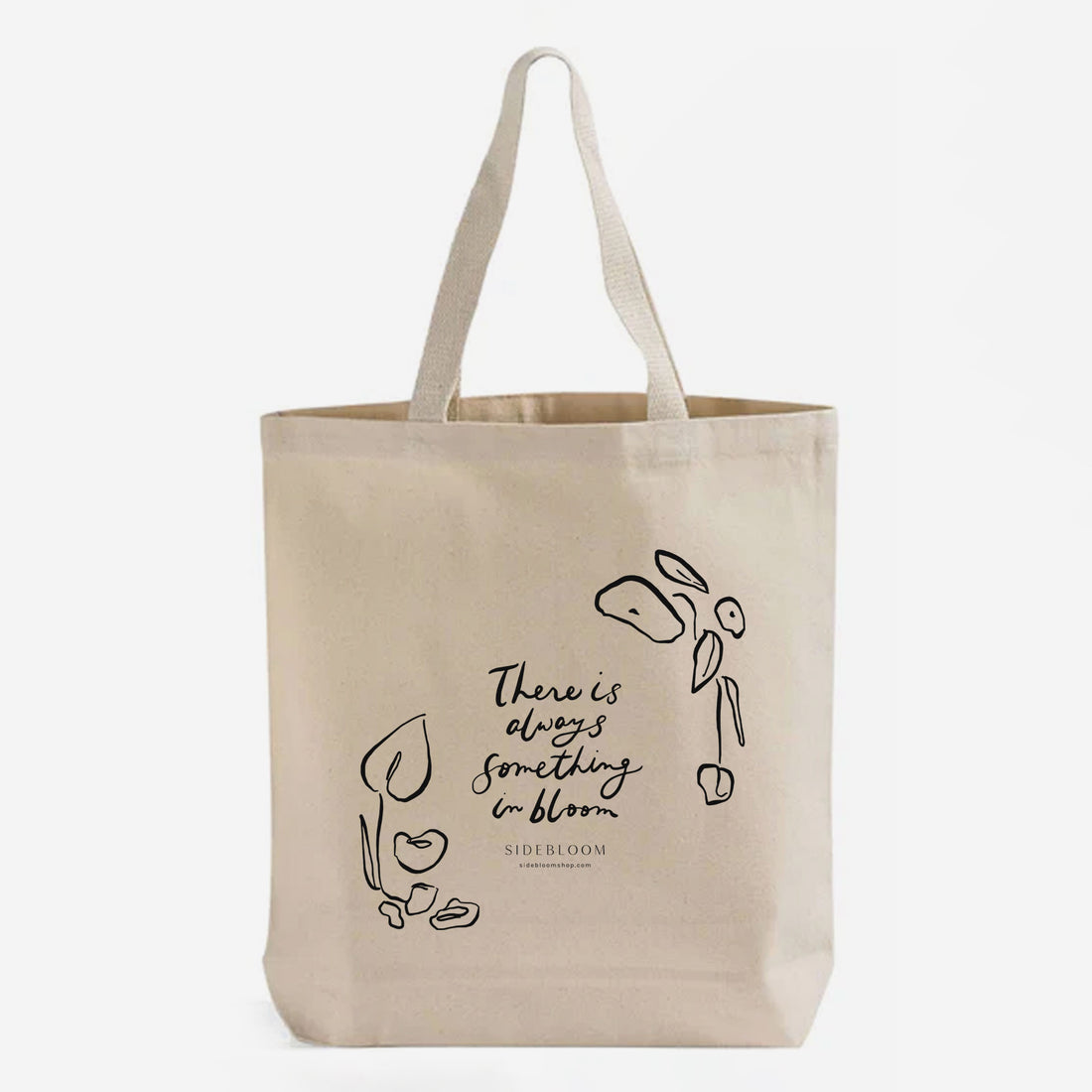canvas tote bag with "There is always something in bloom" text by Sidebloom