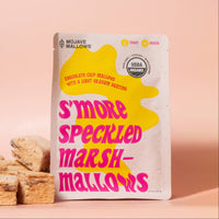 Box of Mojave Mallows S'more Speckled Marshmallows on a pink background