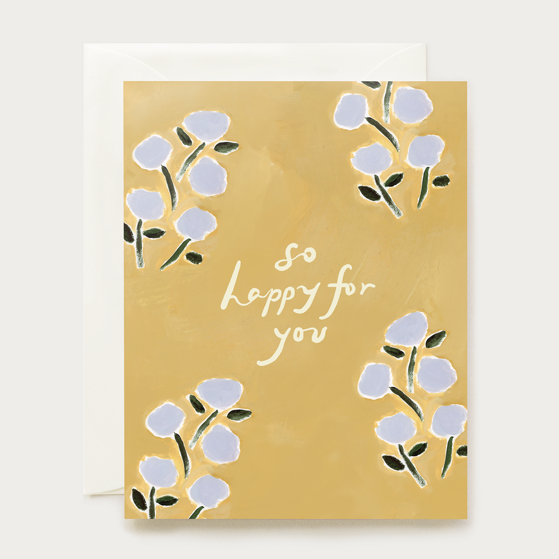 a greeting card with a painterly mustard-yellow background, decorated with four lilac florals and the handwritten text 'so happy for you'