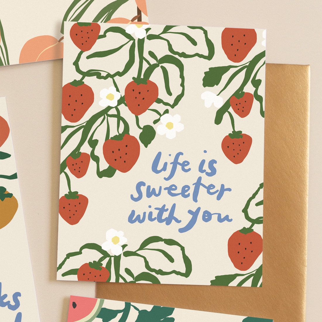 Card with strawberry design and text 'Life is sweeter with you' 