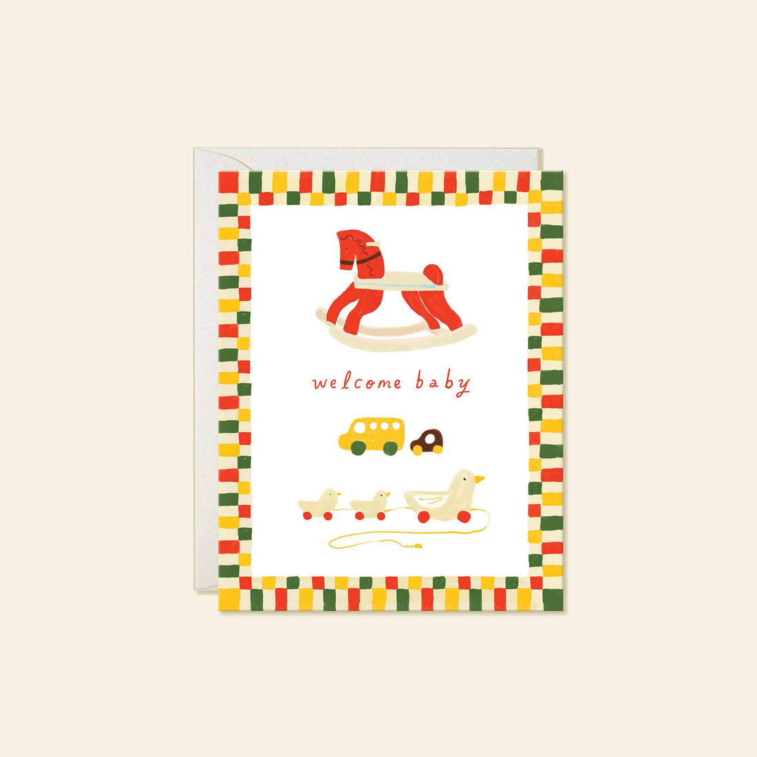 A square baby greeting card with a colorful toy-themed design, featuring a rocking horse, yellow bus, duck, and the words 'welcome baby' 