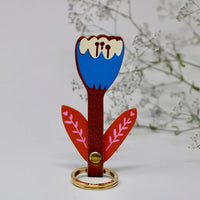 burnt orange and blue tulip leather keychain