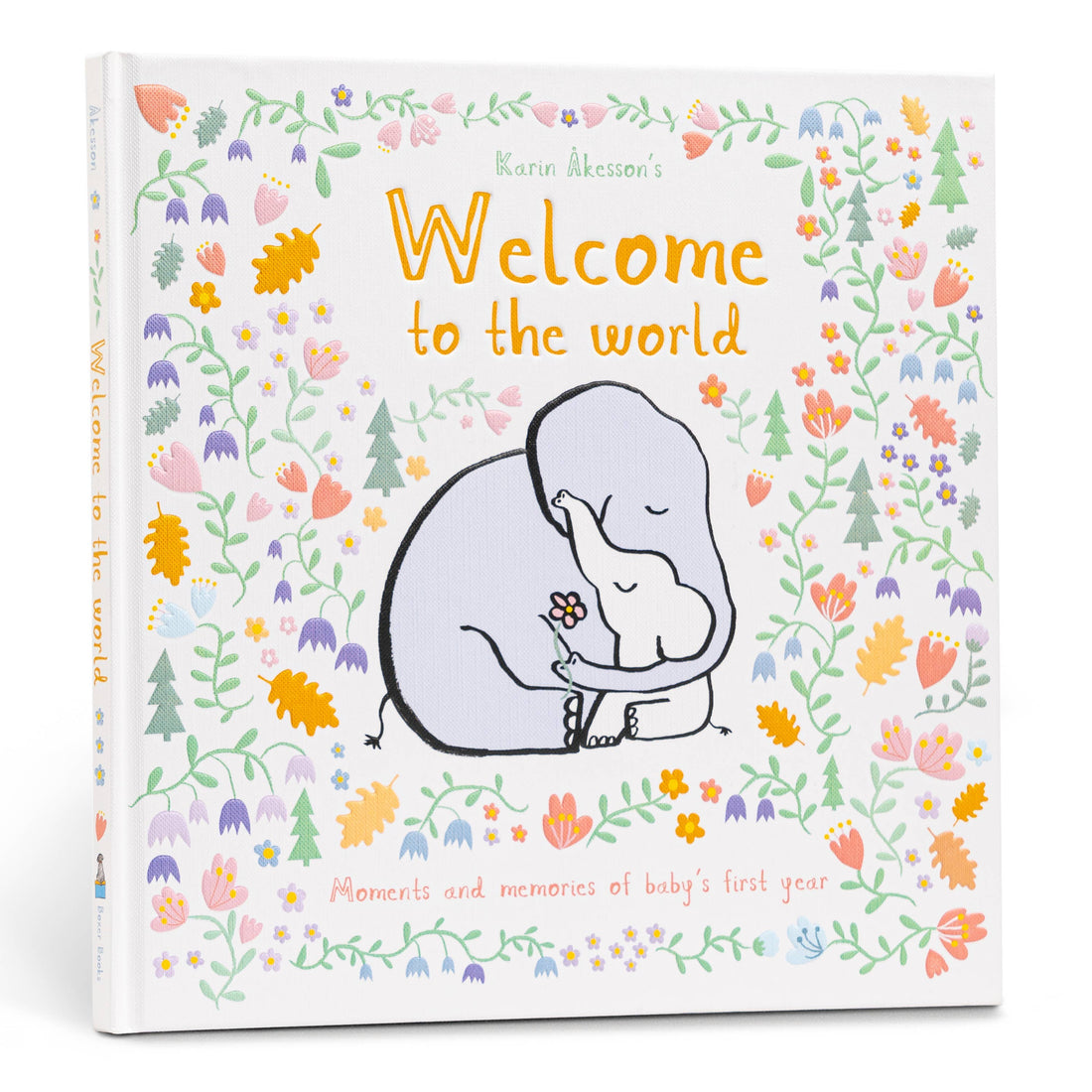 Book titled 'Welcome to the world' with illustrations of elephants and flowers on a white background